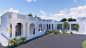 Contemporary Mediterranean style building with arches and lush landscaping.